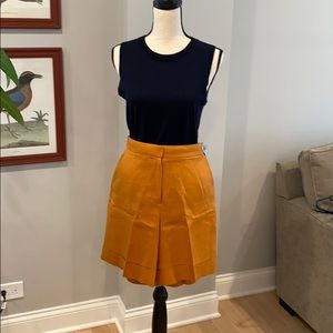 J Crew Rust color Cuffed Bermuda shorts in linen.